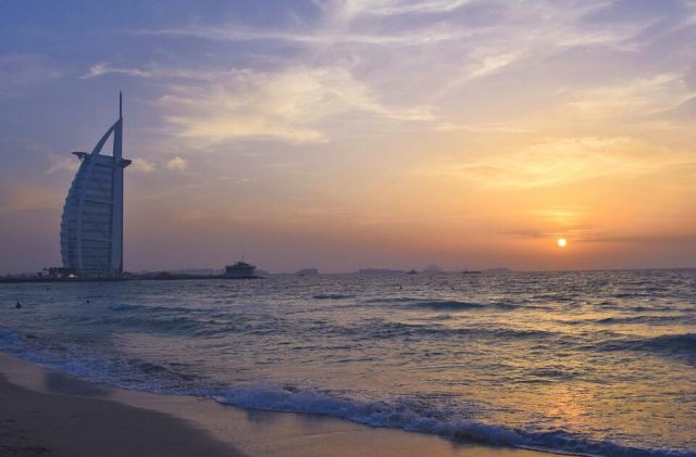 best view of iconic dubai landmarks - burj al arab sunset beach